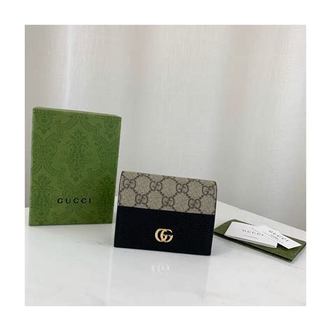 carteira gucci marmont|GG Marmont card case wallet in dark gold leather .